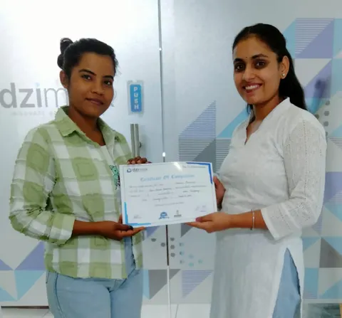 Manisha Bhardwaj receiving a Dzimark training certificate