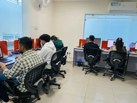 Dzimark students working at computers in the Dzimark training lab